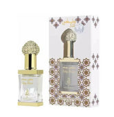 Silky Musk perfume oil with decorative gold filigree cap and geometric pattern packaging